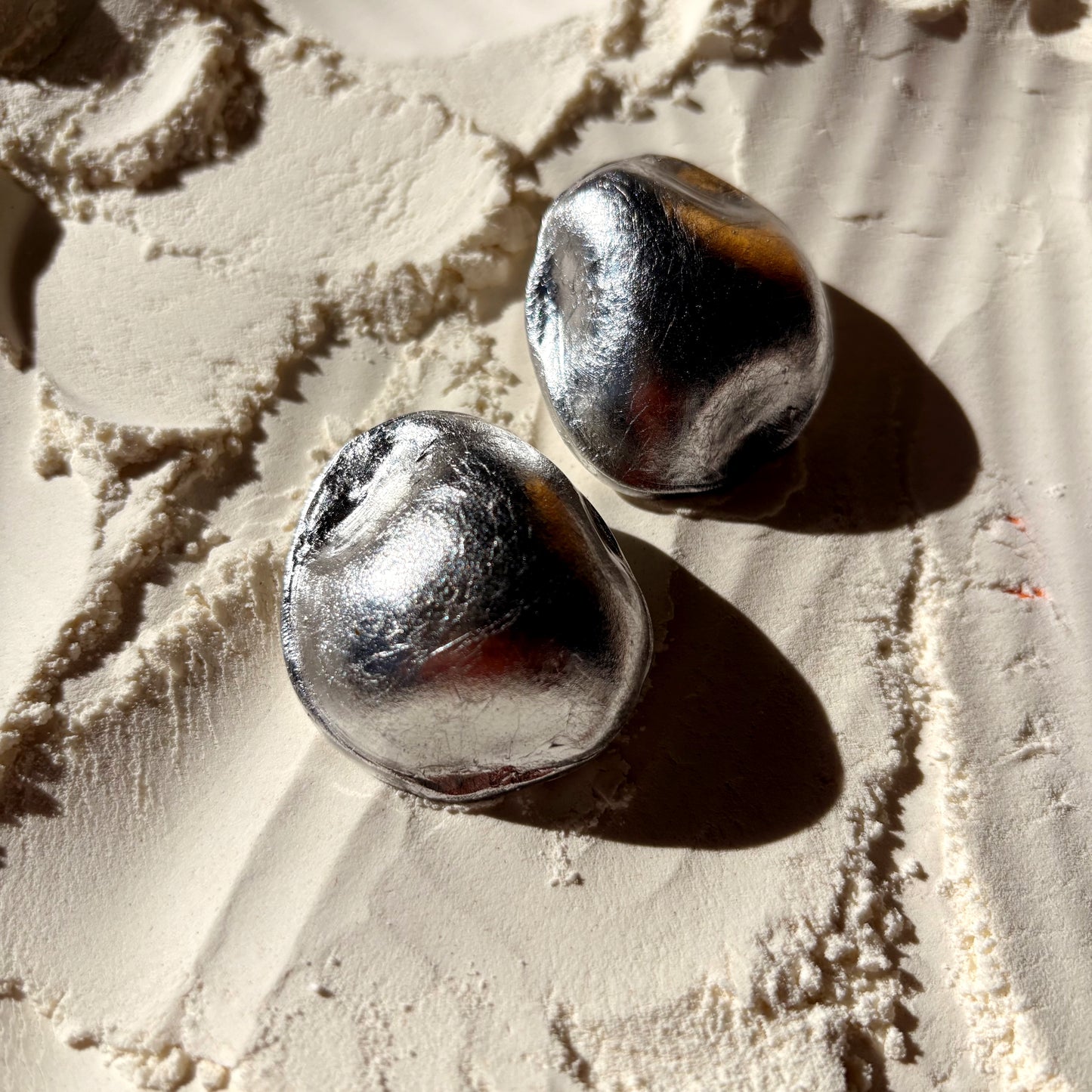 A Reflective Stone (brushed silver)